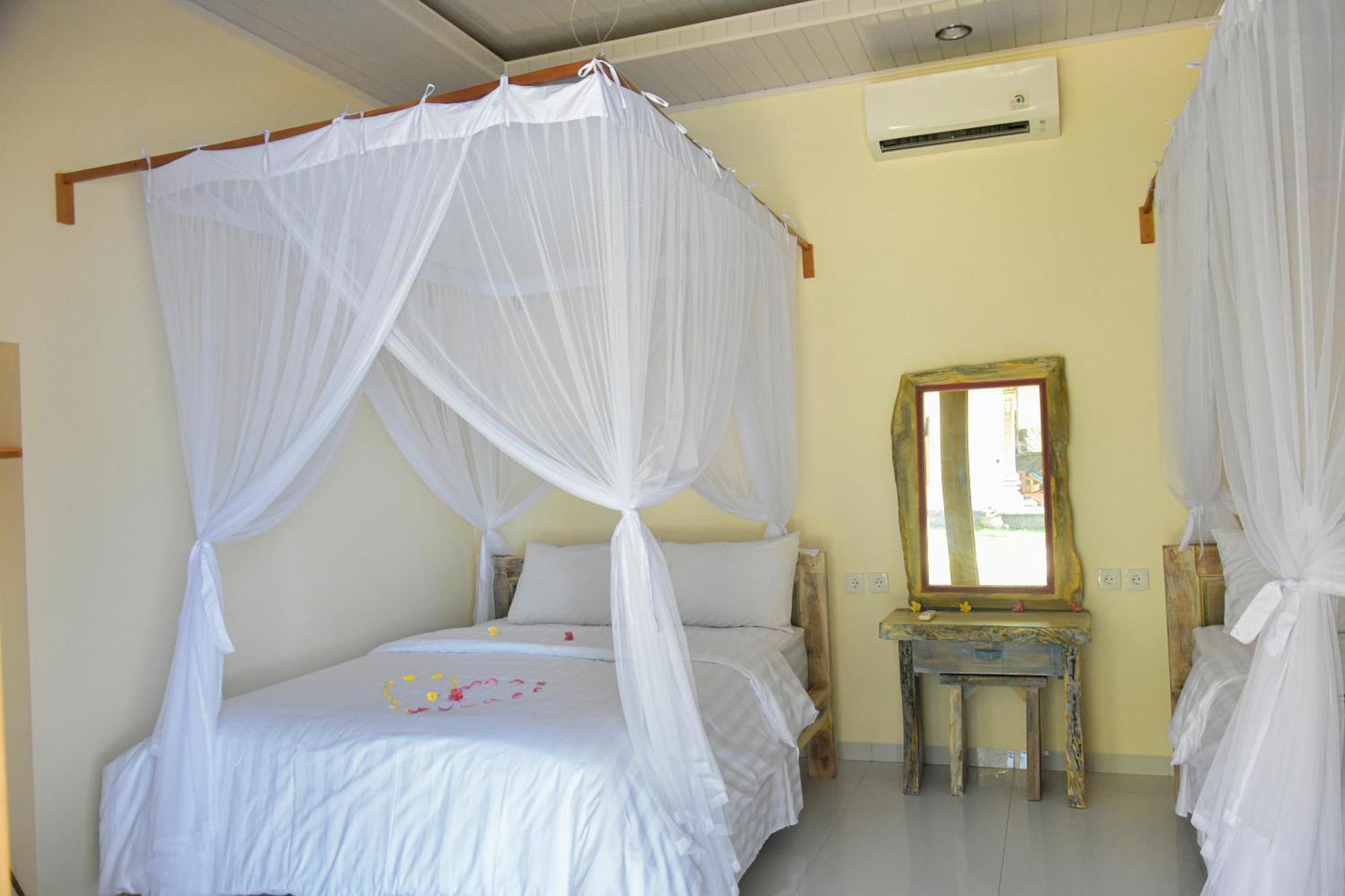 Ganesha Amed Hotel Стая снимка